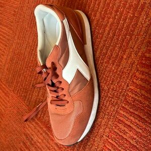 Casual sneakers. Sharp, stylish, faded-red.